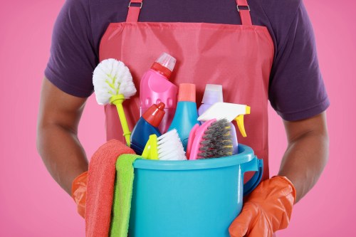 Professional floor and desk cleaning in a workplace