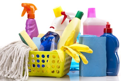 Housekeeper preparing a guest-ready bedroom during Airbnb cleaning